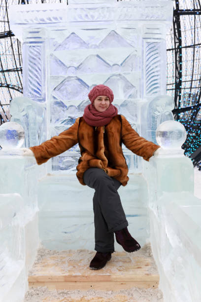 istock Woman sitting on ice throne 1096928418