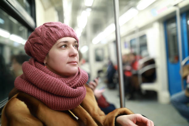 istock Woman in subway train 1096928426