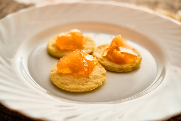 istock Flat cakes with peach marmalade on wihte plate 1096932080