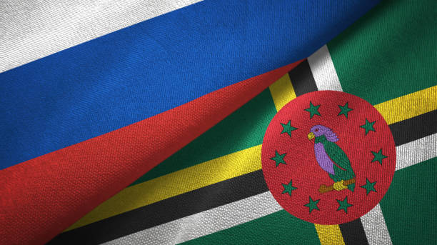 istock Dominica and Russia two flags together textile cloth, fabric texture 1096932926