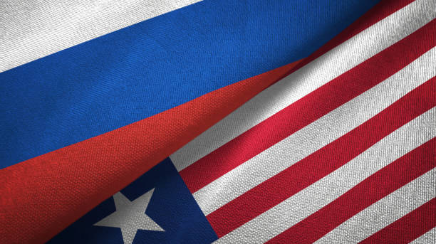 istock Liberia and Russia two flags together textile cloth, fabric texture 1096934122