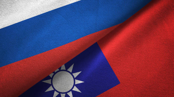 istock Taiwan and Russia two flags together textile cloth, fabric texture 1096934586