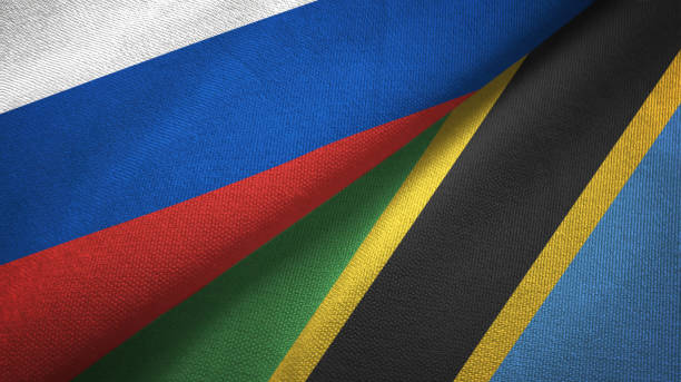istock Tanzania and Russia two flags together textile cloth, fabric texture 1096934594