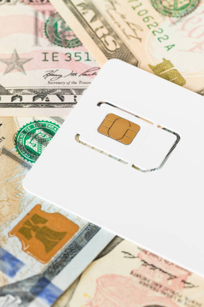 istock Sim card on dollar money banknote 1096935938