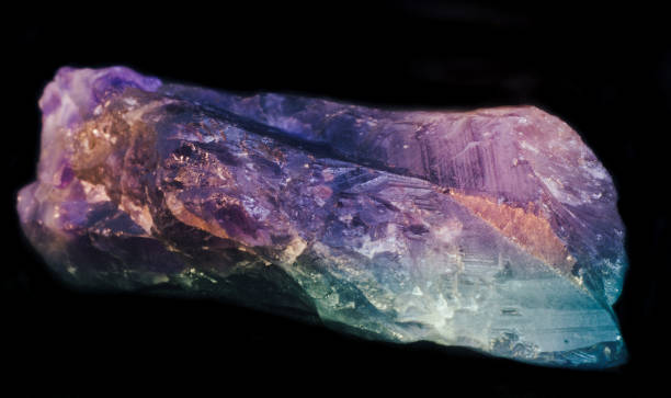 istock Small natural amethyst crystal on black background isolated 1096938290