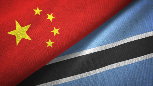 istock Botswana and China two flags together textile cloth, fabric texture 1096940958