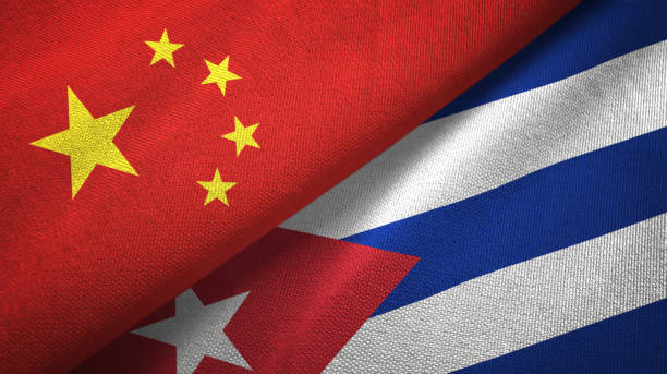 Cuba and China two flags together textile cloth, fabric texture Cuba and China flags together textile cloth, fabric texture cuba market stock pictures, royalty-free photos & images