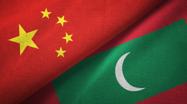 istock Maldives and China two flags together textile cloth, fabric texture 1096942516