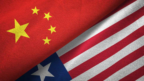 istock Liberia and China two flags together textile cloth, fabric texture 1096942668