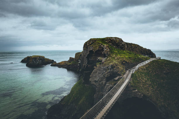 istock carrick-a-rede rope bridge, northern ireland 1096944264