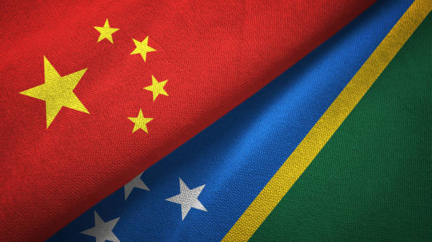 Solomon Islands and China two flags together textile cloth, fabric texture Solomon Islands and China flags together textile cloth, fabric texture government large currency finance stock pictures, royalty-free photos & images