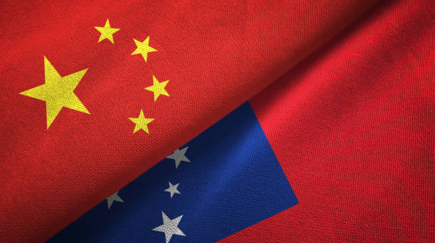 istock Samoa and China two flags together textile cloth, fabric texture 1096944426