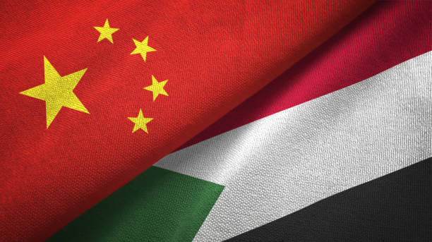 sudan e cina due bandiere insieme tessuto, tessuto texture - republic of the sudan foto e immagini stock