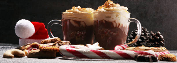 istock Hot chocolate cocoa with whipped cream for xmas on table 1096944776