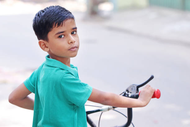 istock Indian Little Boy with Cycle 1096945816