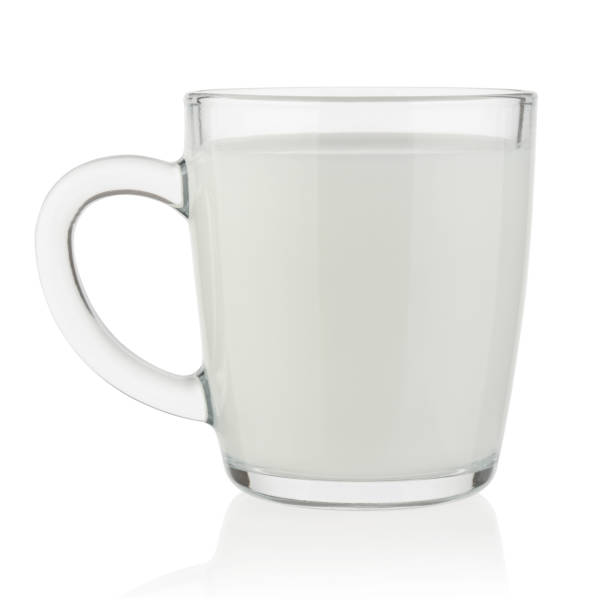 istock Glass mug with milk isolated on white 1096948508