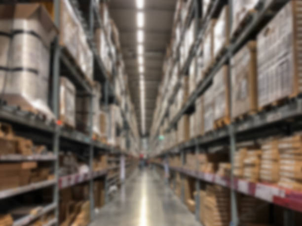 istock Blurred interior of warehouse background 1096949274