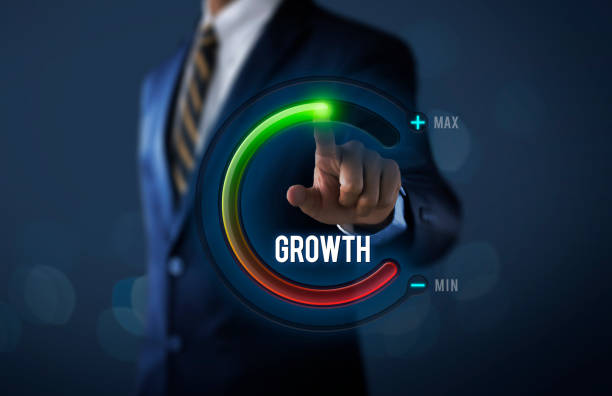 istock Business growth or career growth concept. Businessman is pulling up circle progress bar with the word GROWTH on dark tone background. 1096952512