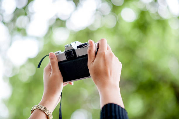 istock Hand and camera shots Photography concept With copy space 1096953220