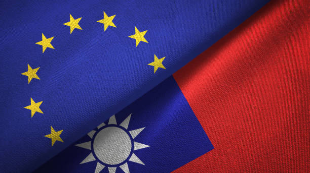 istock Taiwan and European Union two flags together textile cloth, fabric texture 1096956158