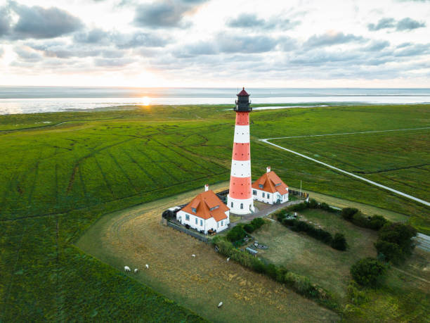 istock Sunset at Westerheversand Lighthouse Nordfriesland Germany 1096958494
