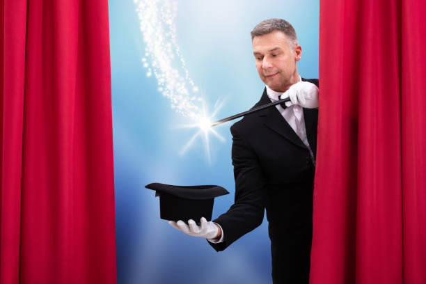 istock Magician's Hand With Wand And Hat 1096960008