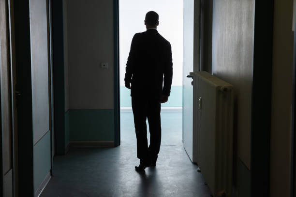 istock Businessman Standing In Front Of Open Door 1096960036
