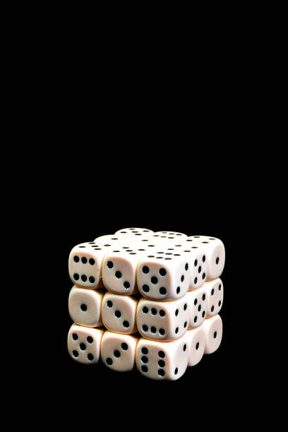 istock dice in the form of a cube on a black background 1096960568