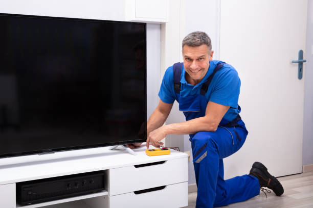 istock Male Technician Repairing Television 1096963654