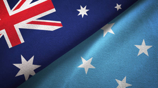 istock Micronesia and Australia two flags together textile cloth, fabric texture 1096964072