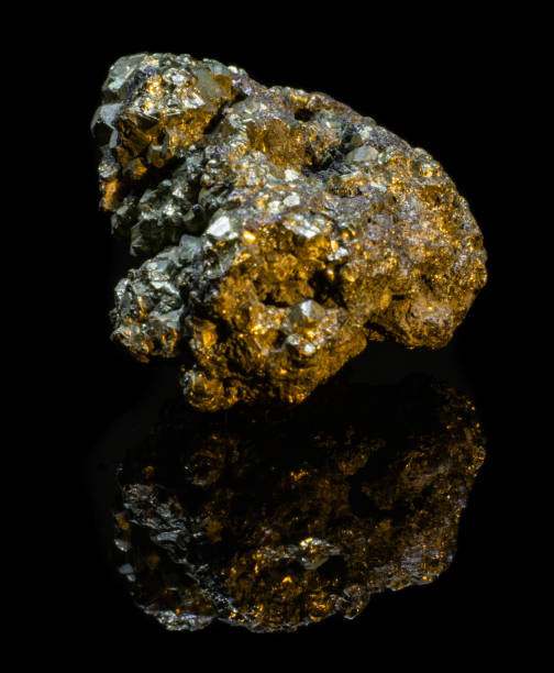 istock Natural druse of pyrite on a black background with reflection 1096967238