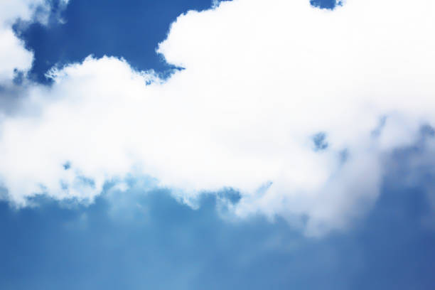 Photo of Deep blue sky with big puffy white cloud