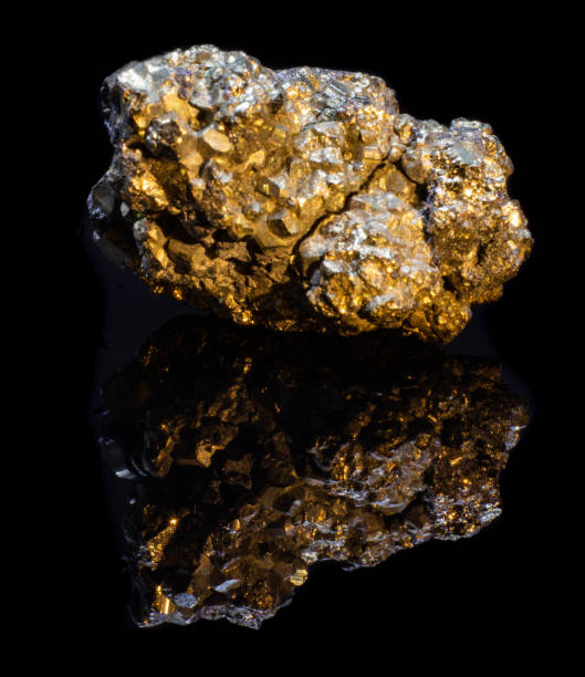 istock Natural druse of pyrite on a black background with reflection 1096969694