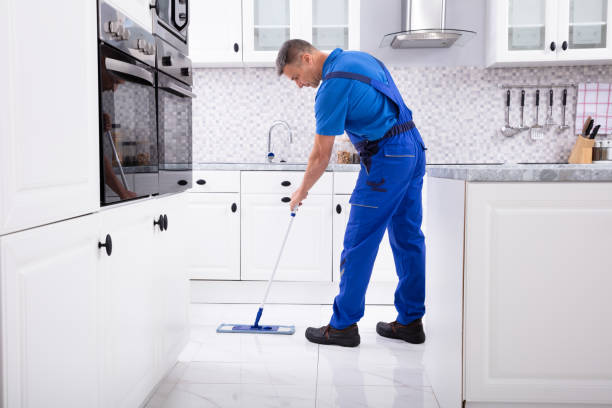 istock Male Janitor Cleaning Floor With Mop 1096969742