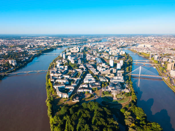 Nantes aerial panoramic view, France Nantes city between the branches of the Loire river aerial view in Loire-Atlantique region in France loire atlantique photos stock pictures, royalty-free photos & images