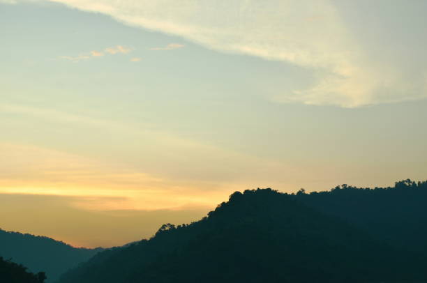 istock sunrise behind mountain on river 1096978300