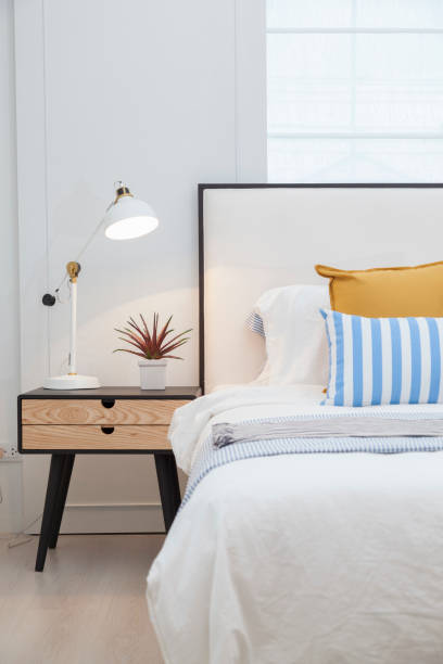 istock Modern home interior with bedroom setting including bedside table ,white lamp. 1096983390