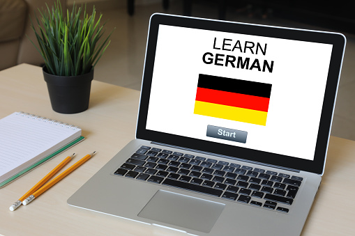 Learn German language online e-learning computer software laptop desk