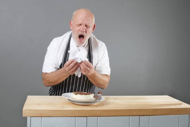 istock chef sneezing over food 1096988978