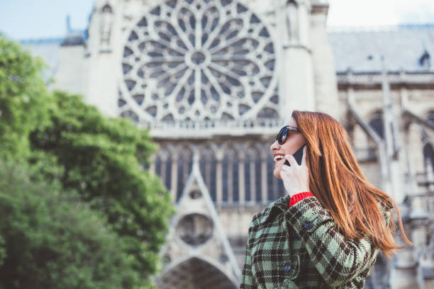 istock Woman in Paris talking on phone 1096993472