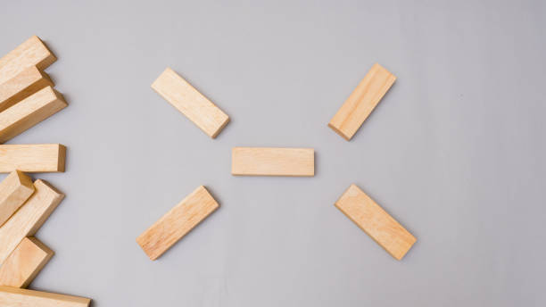 istock Wood block stacking symbol top view.Business concept on gray background 1096995250
