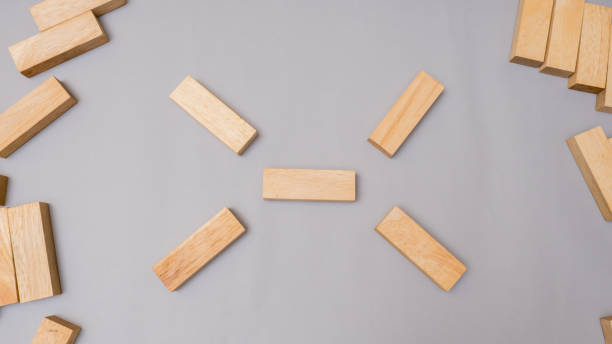 istock Wood block stacking symbol top view.Business concept on gray background 1096995264