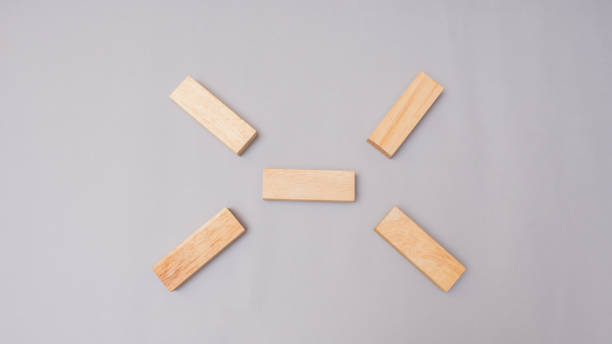 istock Wood block stacking symbol top view.Business concept on gray background 1096995268