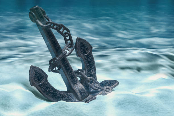 Anchor on ocean bottom underwater. 3D rendering Anchor on ocean bottom underwater. 3D rendering sunken stock pictures, royalty-free photos & images