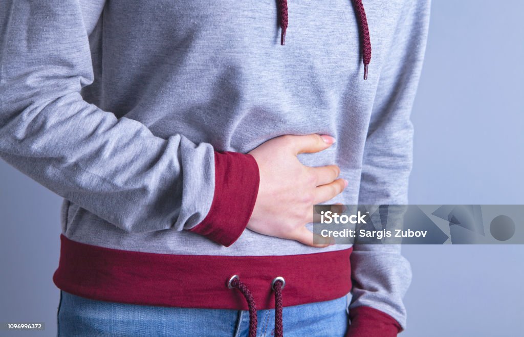 Stomach Pain Girl Stock Photo Download Image Now Arm Food stomach-pain-girl-stock-photo-download-image-now-arm-food