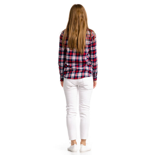 istock Woman in white jeans and shirt 1097008764