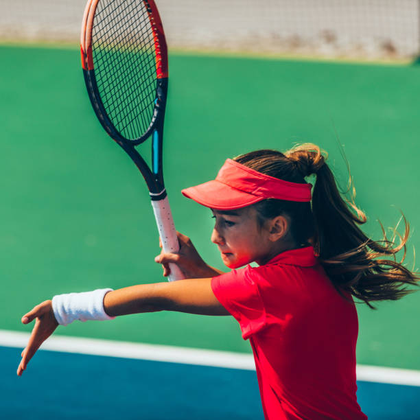 istock Girl Playing Tennis 1097009094