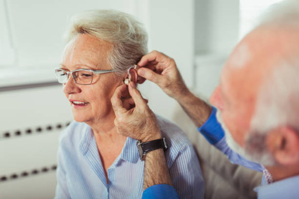 istock Older woman and man or pensioners with a hearing problem 1097010112