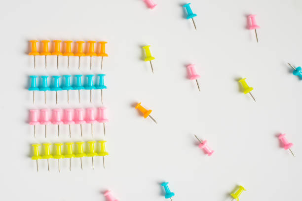 istock Colorful pushpins on white. Colored pushpins 1097017286