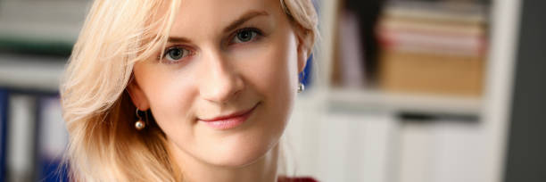 istock Normal blond woman portrait at office 1097020394